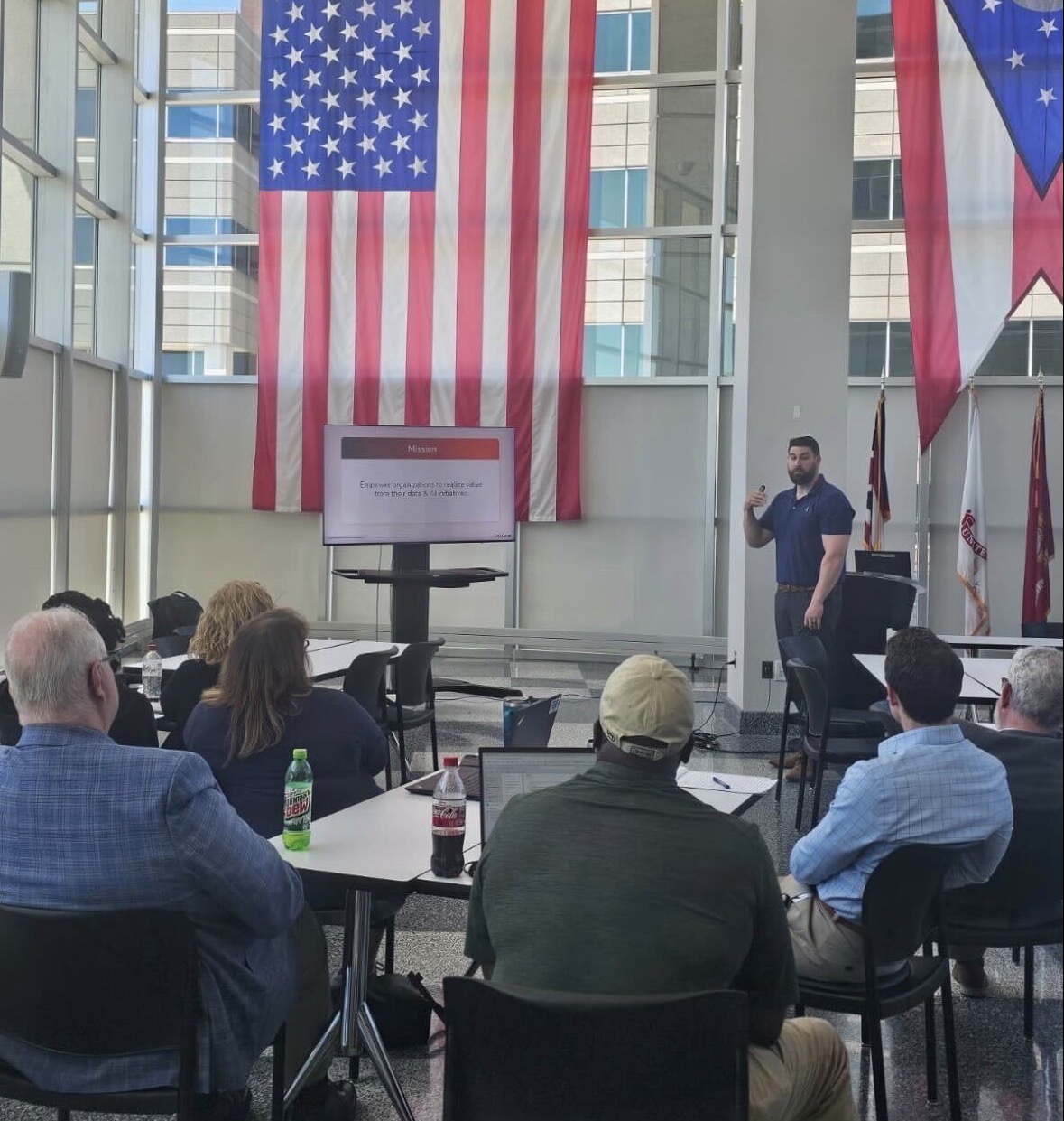 Pete presenting to a room of professionals